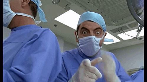 Mr Bean as a doctor giving a thumbs up